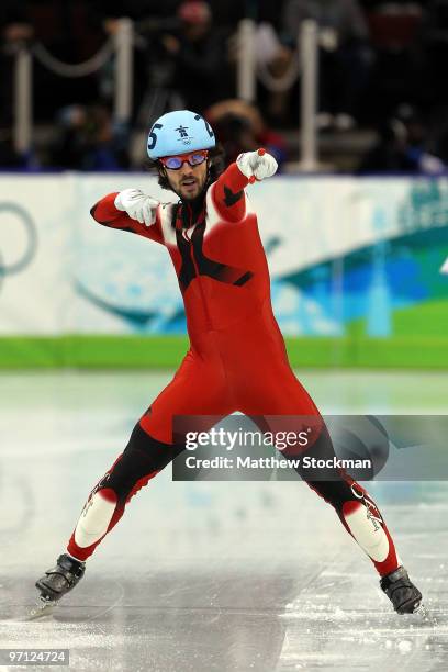 Gold medalist Charles Hamelin celebrates in the Men's 500m Short Track Speed Skating Final on day 15 of the 2010 Vancouver Winter Olympics at Pacific...