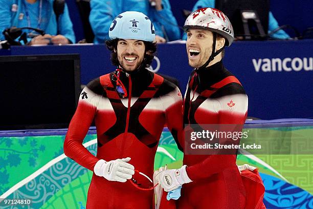 Gold medalist Charles Hamelin of Canada celebrates with bronze medalist Francois-Louis Tremblay of Canada in the Men's 500m Short Track Speed Skating...