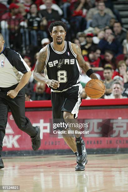 Roger Mason Jr. #8 of the San Antonio Spurs drives the ball against the Houston Rockets on February 26, 2010 at the Toyota Center in Houston, Texas....