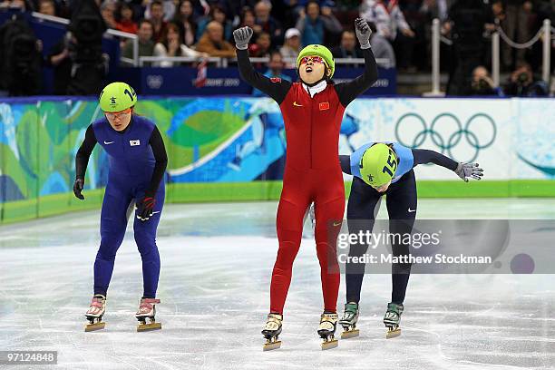 Wang Meng of China celebrates the gold medal in the Ladies 1000m Short Track Speed Skating Final on day 15 of the 2010 Vancouver Winter Olympics at...