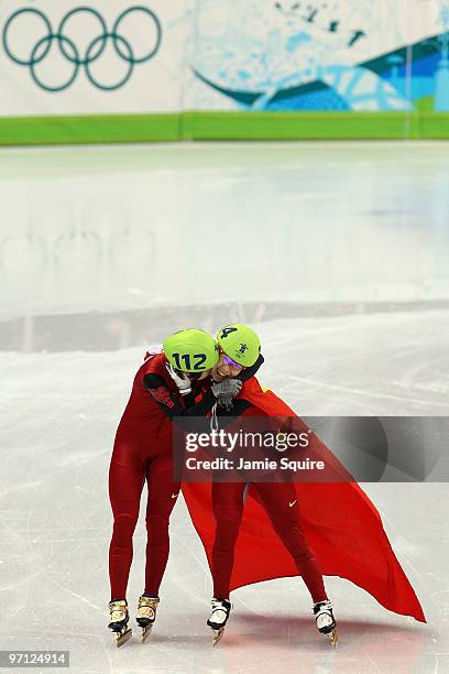 Gold medalist Wang Meng of China celebrates with Zhou Yang in the Ladies 1000m Short Track Speed Skating Final on day 15 of the 2010 Vancouver Winter...