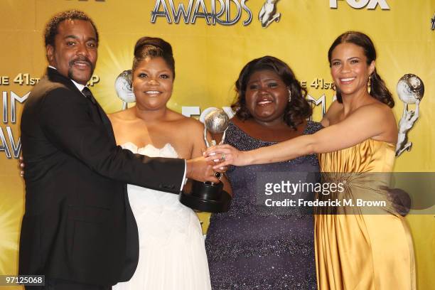 Director Lee Daniels, actresses Mo'Nique, Gabourey Sidibe, and Paula Patton pose in the press room with the award for Outstanding Motion Picture for...