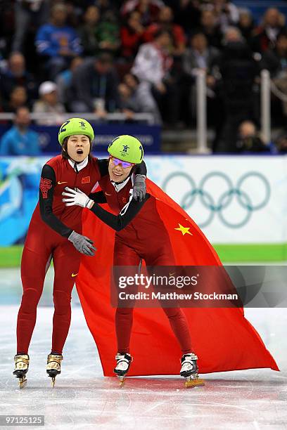 Gold medalist Wang Meng of China celebrates with Zhou Yang in the Ladies 1000m Short Track Speed Skating Final on day 15 of the 2010 Vancouver Winter...