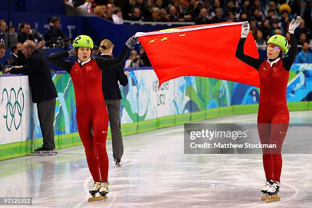 Gold medalist Wang Meng of China celebrates with Zhou Yang in the Ladies 1000m Short Track Speed Skating Final on day 15 of the 2010 Vancouver Winter...