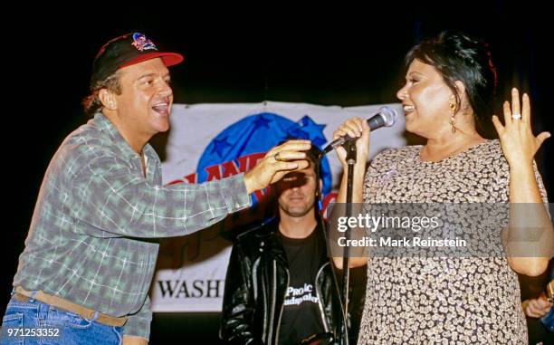 View of celebrities arriving and performing on stage at the grand opening of the Planet Hollywood night club in Washington, DC, October 3, 1993.