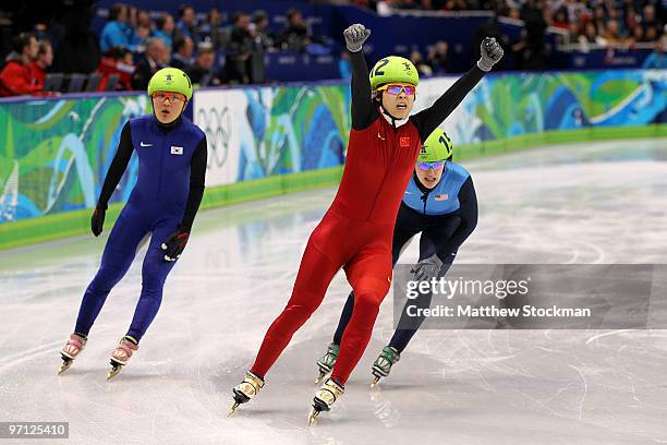 Wang Meng of China celebrates the gold medal in the Ladies 1000m Short Track Speed Skating Final on day 15 of the 2010 Vancouver Winter Olympics at...