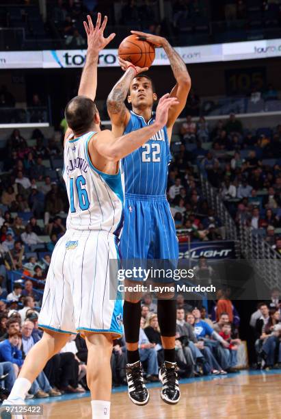 Matt Barnes of the Orlando Magic shoots over Peja Stojakovic of the New Orleans Hornets on February 26, 2010 at the New Orleans Arena in New Orleans,...