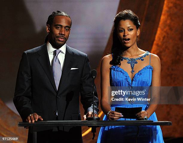Personality Jeff Johnson and actress Claudia Jordan speak onstage during the 41st NAACP Image awards pre-tel show held at The Shrine Auditorium on...