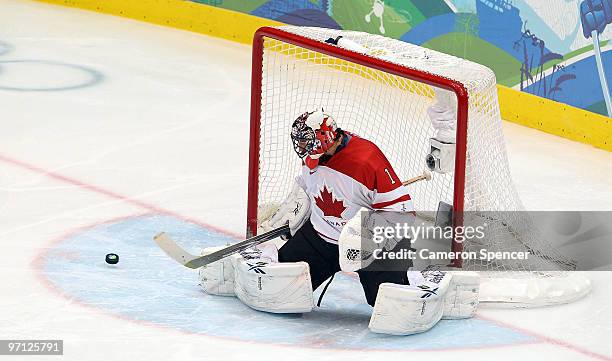 Goalkeeper Roberto Luongo of Canada makes a save during the ice hockey men's semifinal game between the Canada and Slovakia on day 15 of the...