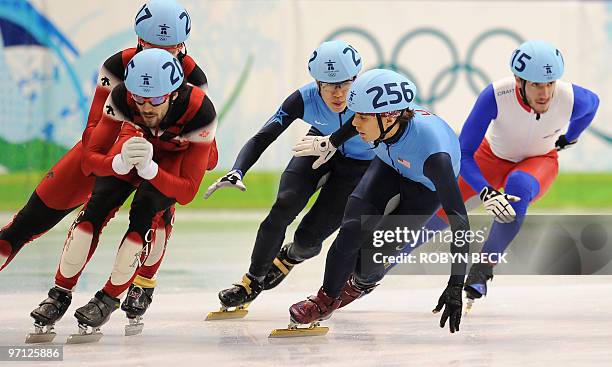 Lto R, Canada's Charles Hamelin, US Apolo Anton Ohno and France's Thibaut Fauconnet compete in the Men's 5000 m relay short-track final at the...