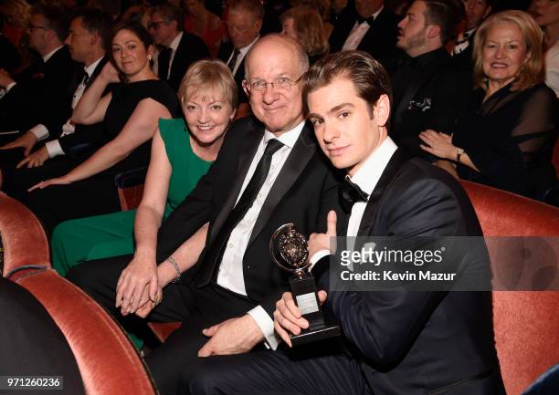 Lynn Garfield, Richard Garfield and Andrew Garfield pose in the audience during the 72nd Annual Tony Awards at Radio City Music Hall on June 10, 2018...