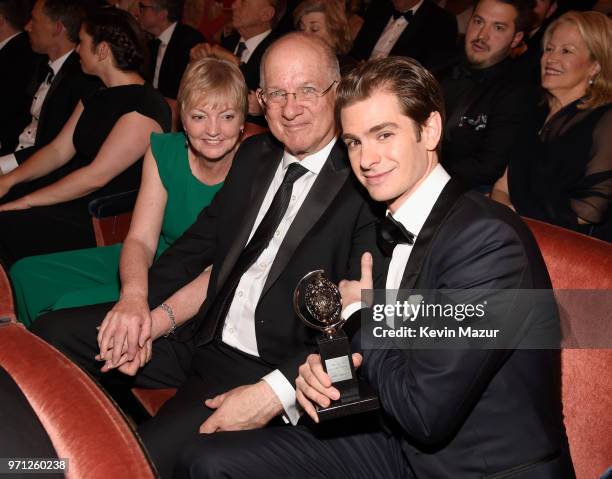 Lynn Garfield, Richard Garfield and Andrew Garfield pose in the audience during the 72nd Annual Tony Awards at Radio City Music Hall on June 10, 2018...