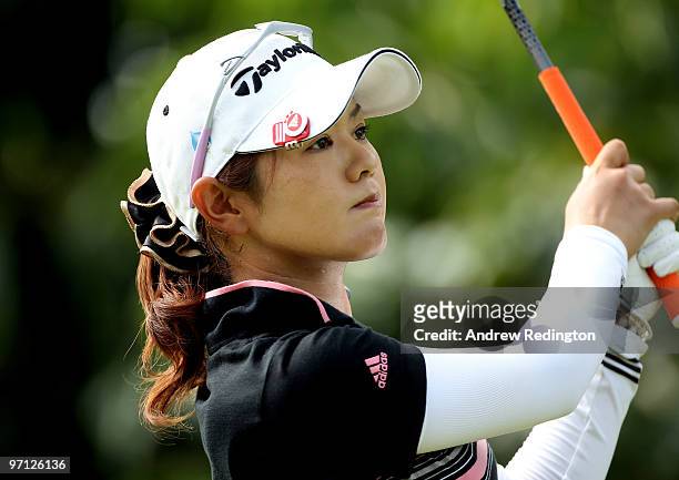 Shinobu Moromizato of Japan hits her tee-shot on the eighth hole during the third round of the HSBC Women's Champions at the Tanah Merah Country Club...