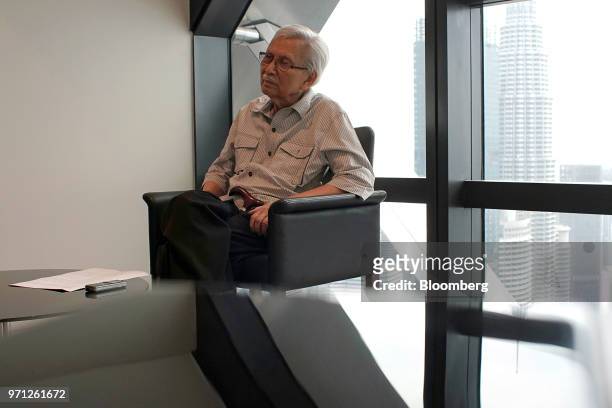 Daim Zainuddin, a member of Malaysia Prime Minister Mahathir Mohamad's advisory council, listens during an interview in Kuala Lumpur, Malaysia, on...