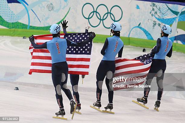 The United States relay team celebrate the bronze medal after the Men's 5000m Relay Short Track Speed Skating Final on day 15 of the 2010 Vancouver...