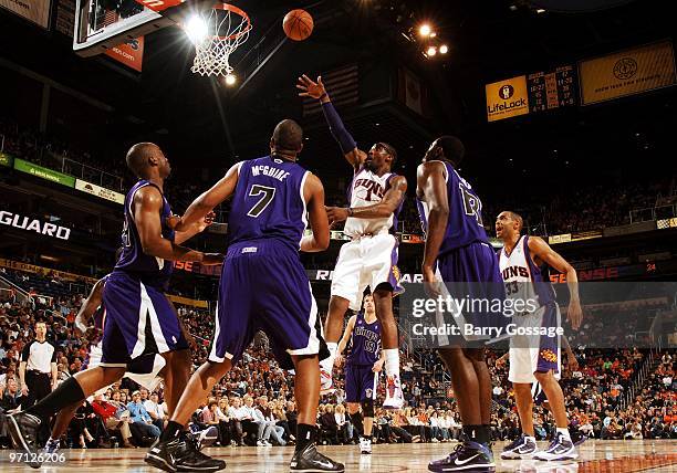 Amar'e Stoudemire of the Phoenix Suns puts up a shot against Carl Landry, Dominic McGuire and Tyreke Evans of the Sacramento Kings during the game at...