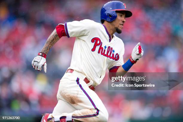 Philadelphia Phillies Infield J.P. Crawford rounds first on a double in the sixth inning during the game between the Milwaukee Brewers and...