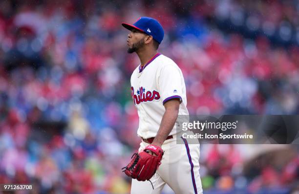 Philadelphia Phillies Pitcher Seranthony Dominguez walks back to the dugout after pitching in the seventh inning during the game between the...