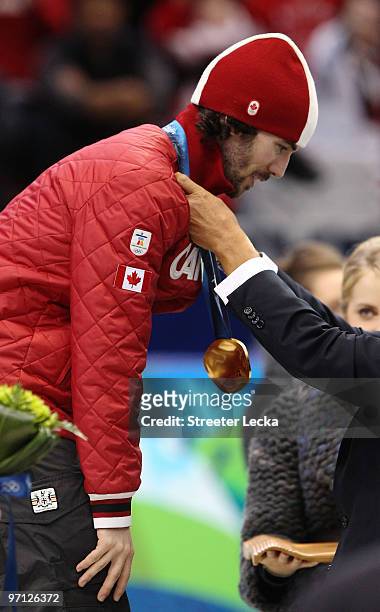 Gold medalist Charles Hamelin of Canada receives his medal after the Men's 500m Short Track Speed Skating Final on day 15 of the 2010 Vancouver...