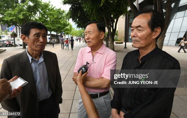 This picture taken on June 8, 2018 shows Choi Ho-chul , a 73-year-old South Korean former bank employee, during a street interview with AFP in Seoul....