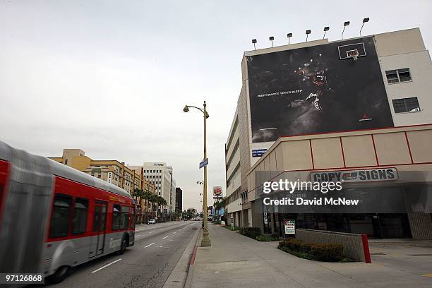 Supergraphic billboard along Wilshire Boulevard is among those at 12 locations that are at the center of a nuisance abatement lawsuit by the city in...