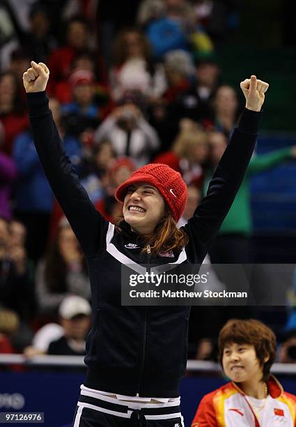 Katherine Reutter of the United States celebrates winning the silver medal the Ladies 1000m Short Track Speed Skating Final on day 15 of the 2010...