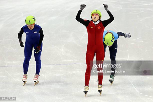 Wang Meng of China celebrates the gold medal in the Ladies 1000m Short Track Speed Skating Final on day 15 of the 2010 Vancouver Winter Olympics at...