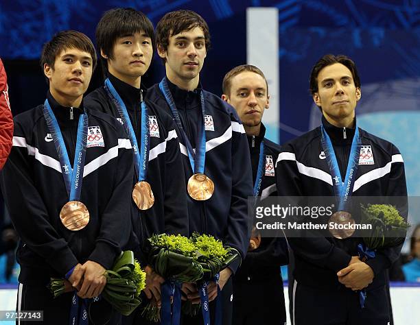 Bronze medalist Apolo Anton Ohno of the United States stands with team mates J.R. Celski, Simon Cho, Travis Jayner and Jordan Malone after the Men's...