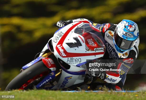 Carlos Checa of Spain and the Althea Racing Team rounds the bend during Superpole for round one of the Superbike World Championship at Phillip Island...