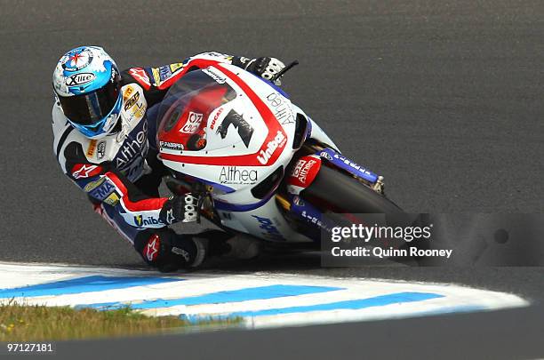 Carlos Checa of Spain and the Althea Racing Team rounds the bend during Superpole for round one of the Superbike World Championship at Phillip Island...