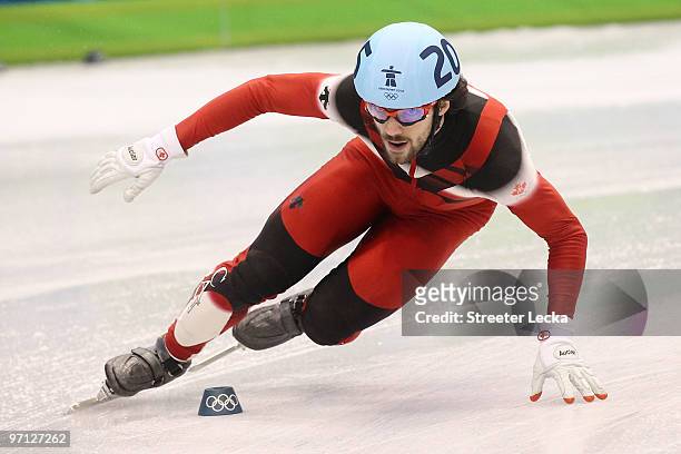 Charles Hamelin of Canada competes in the Men's 5000m Relay Short Track Speed Skating Finals on day 15 of the 2010 Vancouver Winter Olympics at...