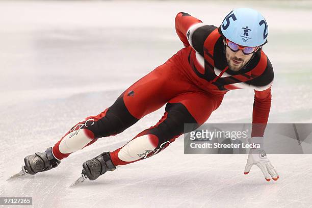 Charles Hamelin of Canada competes in the Men's 5000m Relay Short Track Speed Skating Finals on day 15 of the 2010 Vancouver Winter Olympics at...