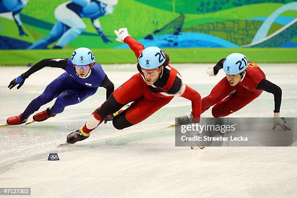 Charles Hamelin of Canada competes in the Men's 5000m Relay Short Track Speed Skating Finals on day 15 of the 2010 Vancouver Winter Olympics at...