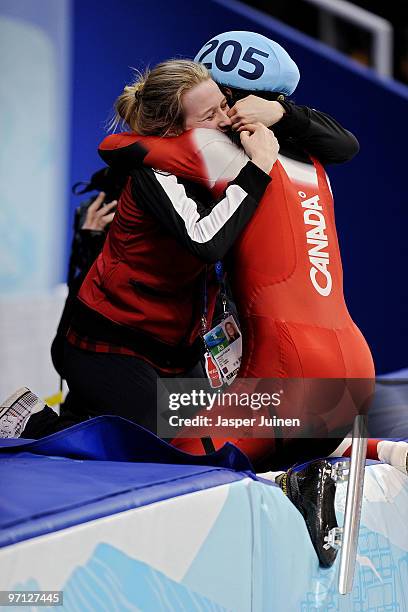 Gold medalist Charles Hamelin celebrates after the Men's 500m Short Track Speed Skating Final on day 15 of the 2010 Vancouver Winter Olympics at...