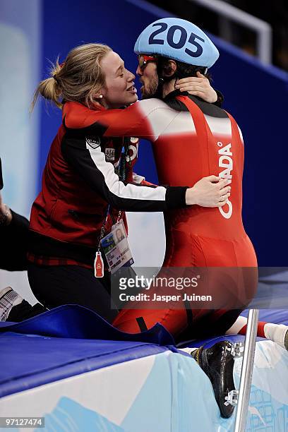 Gold medalist Charles Hamelin celebrates after the Men's 500m Short Track Speed Skating Final on day 15 of the 2010 Vancouver Winter Olympics at...
