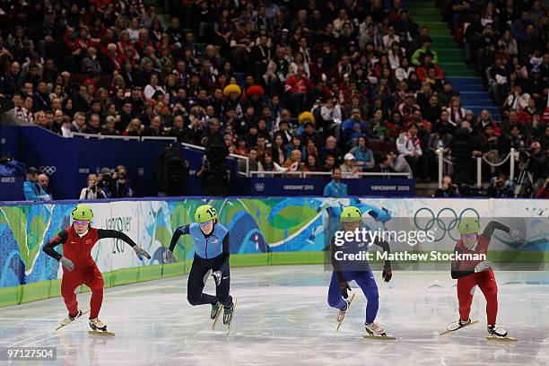 Wang Meng of China, Katherine Reutter of the United States, Park Seung-Hi of South Korea and Zhou Yang of China start the Ladies 1000m Short Track...