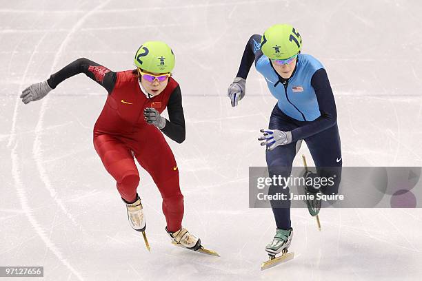 Katherine Reutter of the United States competes against Wang Meng of China in the women's 1000m Short Track Speed Skating Quarter-Finals on day 15 of...