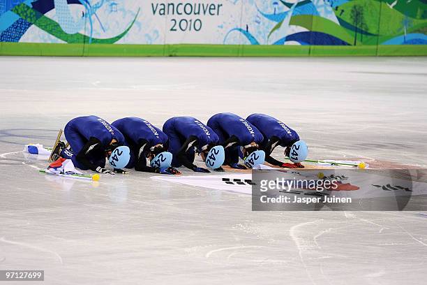 Kwak Yoon-Gy, Lee Ho-Suk, Lee Jung-Su and Sung Si-Bak of South Korea celebrate the silver medal after the Men's 5000m Relay Short Track Speed Skating...