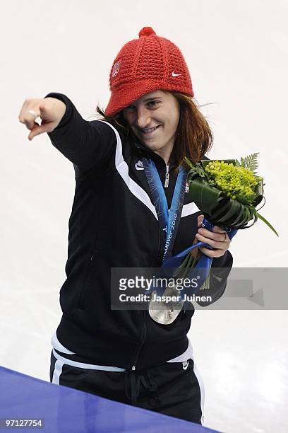 Katherine Reutter of the United States celebrates winning the silver medal in the Ladies 1000m Short Track Speed Skating Final on day 15 of the 2010...