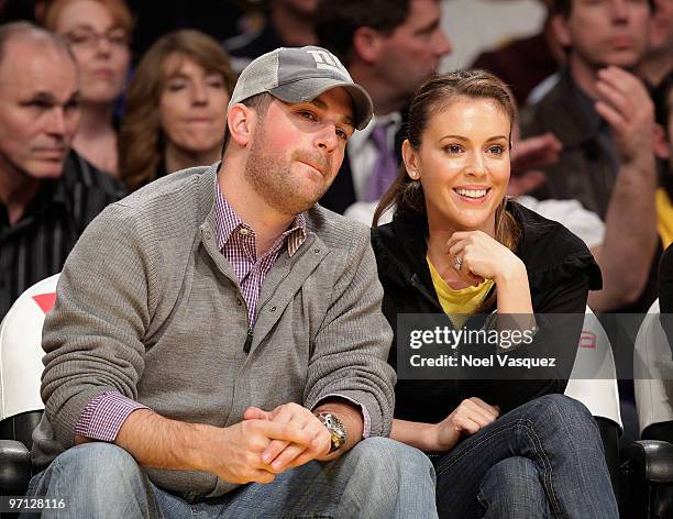 David Bugliari and Alyssa Milano attend a game between the Philadelphia 76ers and the Los Angeles Lakers at Staples Center on February 26, 2010 in...