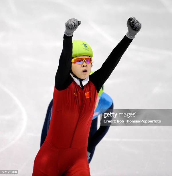 Wang Meng of China celebrates the gold medal in the Ladies 1000m Short Track Speed Skating Final on day 15 of the 2010 Vancouver Winter Olympics at...