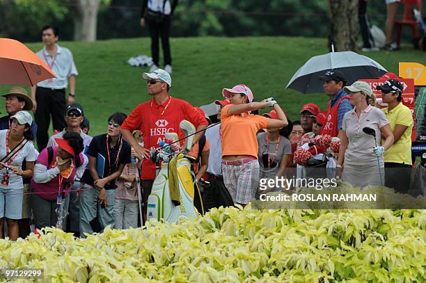 Ai Miyazato of Japan tees off during the third round of the HSBC Women's Championship golf tournament in Singapore on February 27, 2010. Miyazato...