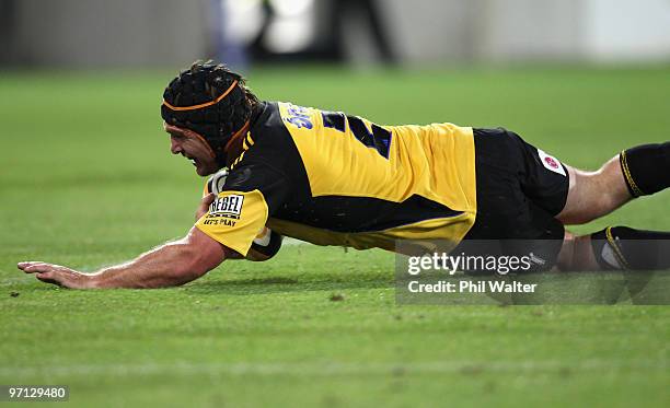 Andrew Hore of the Hurricanes scores a try during the round three Super 14 match between the Hurricanes and the Lions at Westpac Stadium on February...