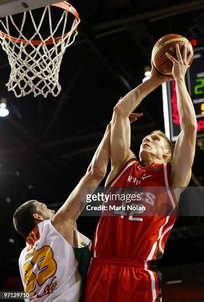 David Gruber of the Hawks drives to the basket during game three of the NBL semi final series between the Wollongong Hawks and the Townsville...