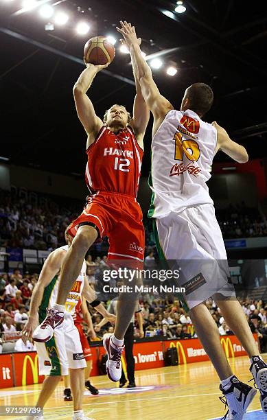 Glen Saville of the Hawks shoots for the basket during game three of the NBL semi final series between the Wollongong Hawks and the Townsville...