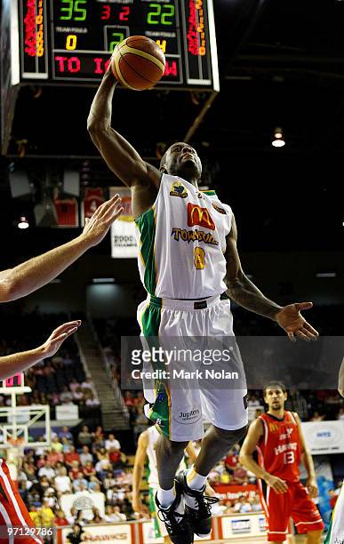 Corey Williams of Townsville drives to the basket during game three of the NBL semi final series between the Wollongong Hawks and the Townsville...