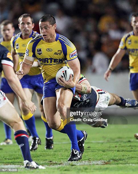 Timana Tahu of the Eels is tackled during the NRL trial match between the Sydney Roosters and the Parramatta Eels at Bluetongue Stadium on February...