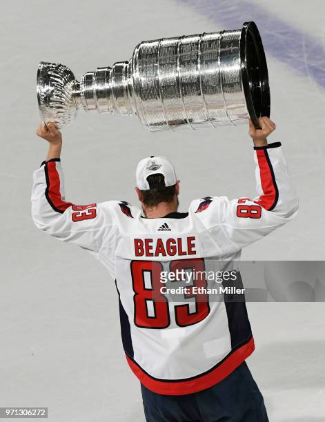Jay Beagle of the Washington Capitals hoists the Stanley Cup after Game Five of the 2018 NHL Stanley Cup Final at T-Mobile Arena on June 7, 2018 in...