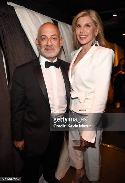 Entertainment's Executive Vice President of Specials, Music and Live Events Jack Sussman and Christine Baranski pose backstage during the 72nd Annual...