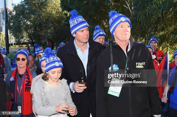 Neale Daniher walks to the MCG as part of Freeze MND during the round 12 AFL match between the Melbourne Demons and the Collingwood Magpies at...